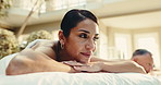 Spa, smile and couple on bed for massage with physical therapy, zen or luxury treatment at resort. Hotel, hospitality and mature people for stress relief, muscle reflexology or holistic detox