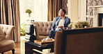 Hotel, lounge and businessman with phone, wait and relax at reception with drink on business trip. Hospitality, travel accommodation and mature person in lobby with tech, luggage and online check in