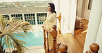 Resort, balcony and happy woman on holiday, thinking and sightseeing on weekend, relax and tourism. Tourist, above and mature person on break, positive attitude and reflection on vacation in hotel