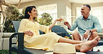 Love, cheers and couple in resort with champagne, connection and bonding trip in anniversary. Smile, toast. and mature people with drink, partner vacation and happy moment on honeymoon celebration.