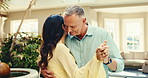 Couple, dance and holding hands on holiday, resort and bonding with partner on anniversary and date. Honeymoon, flare and happy mature people on getaway, commitment and rhythm with spouse in hotel