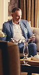 Phone, business and man with coffee in hotel lounge on work trip, luxury hospitality or scroll email. Mobile, mature person or worker with drink for travel, upscale accommodation or communication app