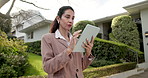 Home, businesswoman and realtor in front yard with tablet, property viewing and check HOA regulation. Real estate agent, mature person and typing outdoor by house with tech, app and research listing.