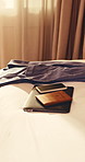 Tech, passport and empty hotel room for business trip, international event and blazer for conference. Professional clothes, phone and ID documents in lodge for overseas work, job convention or travel