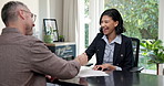 Handshake, office and man with financial advisor for advice, investment planning and assets. Woman, client meeting and shaking hands for paperwork with agreement, deal or retirement benefits