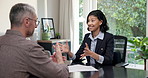 Communication, office and man with financial advisor for advice, investment planning and assets. Woman, client meeting and talk by paperwork for wealth management, finance goals or retirement