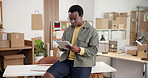 Logistics, boxes and black man with tablet for small business management, shipping or distribution. Male person, employee or supplier checking stock with technology for schedule delivery or service