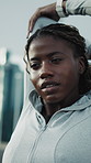 Fitness, black woman and stretching in city for health, injury prevention or muscle preparation. Female person, runner or warm up arms to start exercise outdoor, circulation benefits or neck wellness