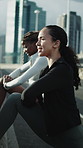 Friends, stretching and talk in city with fitness, advice or runner getting ready for cardio workout. Active, women and warm up outdoor in urban town with discussion, wellness and exercise together.