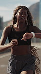 Fitness, woman or running in city with watch for cardio endurance, workout duration or track pace. Jog, black person and runner check time outdoor for exercise performance, VO2 max or health stats