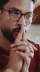Thinking, man and laptop at house for remote work, proofreading and ideas for upcoming article. Thoughts, freelancer and reflection in home with pc, copywriting report and choice for story submission