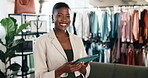 Face, tablet and black woman in boutique for small business, online shop management and laugh. Happy, person and technology in clothing store for retail, fashion industry and trade or app for startup