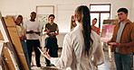 Woman, teaching and canvas in class for painting, guidance and demonstration for creative artwork. Instructor, talk and people in workshop with paint palette, art lesson and beginner advice for craft