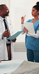 Team, talking or doctor with nurse for question, training or patient folder for healthcare query. Report, people and medical collaboration in clinic ward with hand up, answer and coaching interns