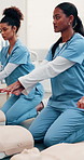 Nurse, students and dummy at hospital for cpr, demonstration and medical course for critical care. Nursing, women and compression in office with mannequin, rescue training and emergency resuscitation