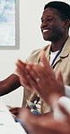 Presentation, meeting and happy man with applause for congratulations or well done in office. Male person, group or employees clapping with smile for thank you, success or good pitch in workplace