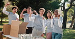 Volunteer, team and cheering in park for food drive, distribution goal and huddle for outreach program. People, excited and outdoor with face for community service, NGO collaboration or event success