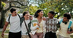 Bonding, friends or college student outdoor with walk, group hug or connection in higher education. Diverse, laugh or people with peer embrace, happy moment or university support in study opportunity
