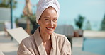 Face, drink and woman at hotel by pool for vacation, holiday and weekend getaway for break. Hospitality, portrait and person with mimosa, juice or cocktail for relax, travel and tourism at resort