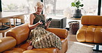 Woman, payment and credit card with phone in home for online shopping or wireless transaction. Happy, mature or female person with smile or debit on smartphone for banking app or ecommerce in house