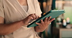 Hospitality, browse or hands in spa with tablet, booking schedule or client records for treatment. Digital, woman or receptionist with tech, appointment review or guest management in wellness center.