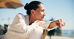 Thinking, woman and smile at resort for travel, enjoy sunshine and daydreaming on summer holiday. Thoughts, mature person and unwind outdoor with happiness, calm morning and vacation at accommodation