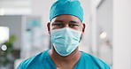 Face mask, surgeon and man in hospital for healthcare, wellness and safety compliance. Portrait, medical professional and hygiene security with ppe, scrubs and surgery employee for support in clinic
