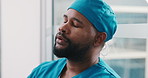 Upset, man and surgeon with stress on glass window for medical failure, bad news or mistake. Frustrated, male person or nurse with disappointment for surgical complication, grief or loss in hospital