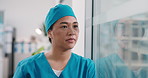 Disappointed, woman and nurse with stress on glass window for medical failure or bad procedure. Upset, female person or health surgeon with reflection for surgical mistake, grief or loss in hospital