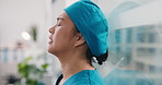 Frustrated, woman or nurse with stress on glass window for medical failure, mistake or bad procedure. Upset, female person or health surgeon with reflection for surgical crisis or loss in hospital