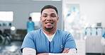 Face, nurse or happy man in hospital with arms crossed for medical career, wellness service or pride. Male person, healthcare professional and confidence in clinic with trust, about us and smile