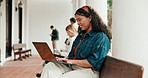 Student, laptop and happy girl studying in university for higher education, research or learning. Female person, learner or typing with smile on computer for online assessment, exam or test on campus
