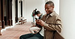 Man, student and typing with phone on campus, online college portal and easy application on site. Education, happy person and digital enrollment with tech for university admissions or academic app