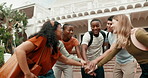 Student, people an high five with hands together in university for achievement, winning or mission. Happy, friends or group piling with smile, applause or stack for higher education or success
