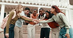 Student, people and applause with hands together in university for achievement, winning or mission. Happy, friends or group piling with smile, clapping or stack for higher education or team success