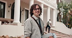 Face, books and happy man at college campus for education, future development and knowledge growth. Textbook, student portrait or male person at university outdoor for learning opportunity with smile