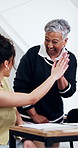 College student, laughing and high five with lecturer, education and smile for academic achievement. University, professor and celebration for success, knowledge and happy people with good news