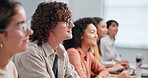 Listening, classroom and students with notes, laptop and lecture for exam prep at college. University, group and people with books, tech and computer for education, learning or lesson for assignment
