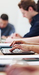 University, hands and student on laptop in classroom for learning, lesson or typing for course notes. College, computer and person in lecture for education, knowledge and studying for assignment