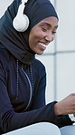 Happy, black woman and headphones in city for fitness, streaming and podcast for exercise break. Smile, muslim person and relax outdoor for fresh air, listening to music and funny audio for training