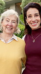 Face, neighborhood and woman with senior mom for dream house, embrace and property investment. Portrait, real estate and person with elderly parent hug for purchase, new home or bonding in front yard