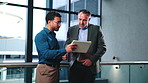 Business, review or team in agency with tablet, budget outlook or growth plan for finance portfolio. Digital, men or wealth advisor with tech, forecast discussion or feedback on strategy report.