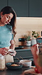 Couple, cooking and video recording in kitchen with breakfast, recipe tutorial and food influencer. Married, woman and man prepare morning meal in home for wellness, content creation or social media.