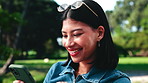 Scroll, phone or woman laugh at park with social media meme, text or reading notification on holiday. Mobile, outdoor or happy person with app for contact response, joke or connection on vacation