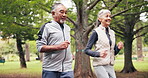 Park, running and senior couple with smile, outdoor and training with partner for health or fitness. Happy, old people and exercise routine with spouse, wellness and physical activity in nature