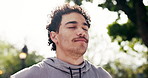 Fitness, man and relax at park with deep breath, post exercise or calm nervous system for wellness. Thinking, peaceful athlete and exhale outdoor for workout cool down, active practice and fresh air