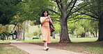 Student, walk and outdoor at university with phone, check social media or text message for education. Happy, woman and journey at college with tech, reading email and thinking of learning in morning.