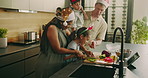 Family, kitchen and Christmas food preparation in home for festive celebration dinner together. Mom, dad and bonding with children, vegetables or ingredients for December holiday recipe in house