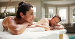 Woman, relax and couple at spa with smile, discussion and physical therapy for romantic getaway. Happy, mature people and rest at resort for anniversary, conversation and pamper partner on vacation
