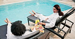 Friends, spa and toast by pool with drinks, food and relax together for luxury holiday experience. Happy, mature women and cheers at resort with mimosa, charcuterie board and outdoor from high angle.